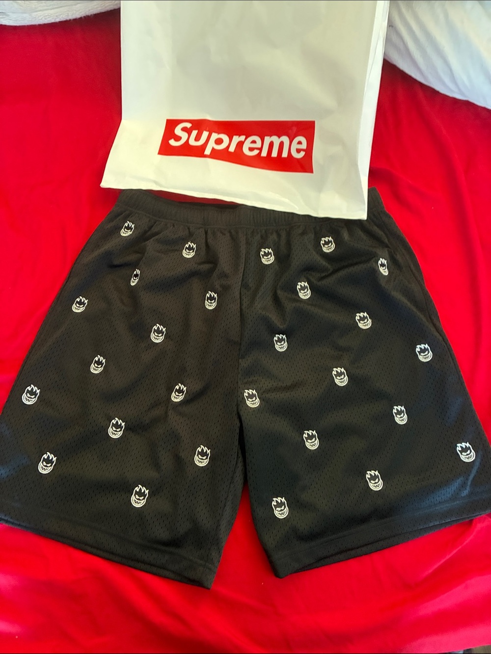 Supreme Black Shorts with White Repeating Logo